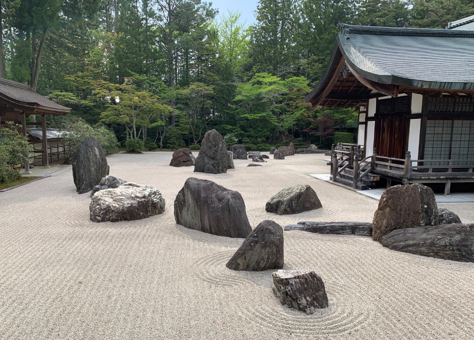 Traditional Japanese building with rock circle